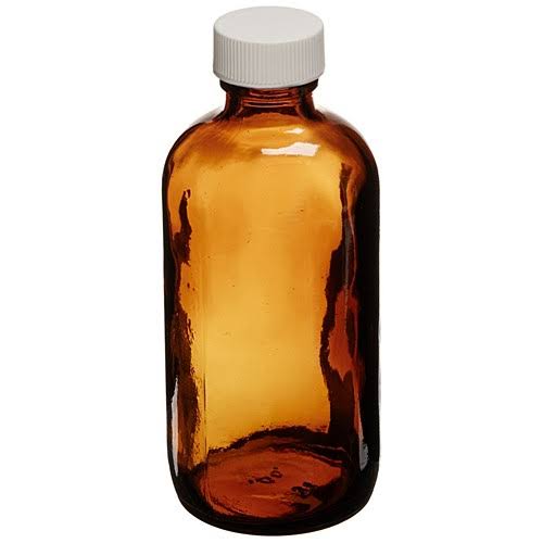 2 oz Amber Boston Round Bottle with White Polypropylene Closure K60645